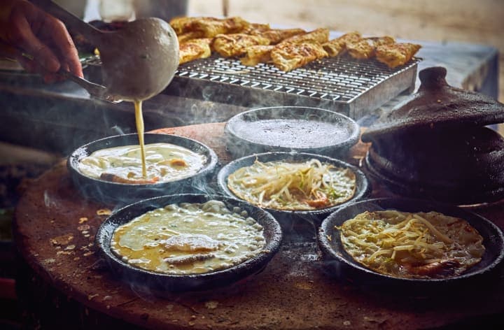 Streetfood- & scootertour naar de highlights van Ho Chi Minhstad thumbnail